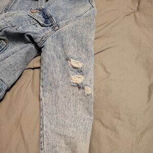 Distressed denim jacket